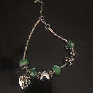Bracelet silver tone with green accent stones heart charm